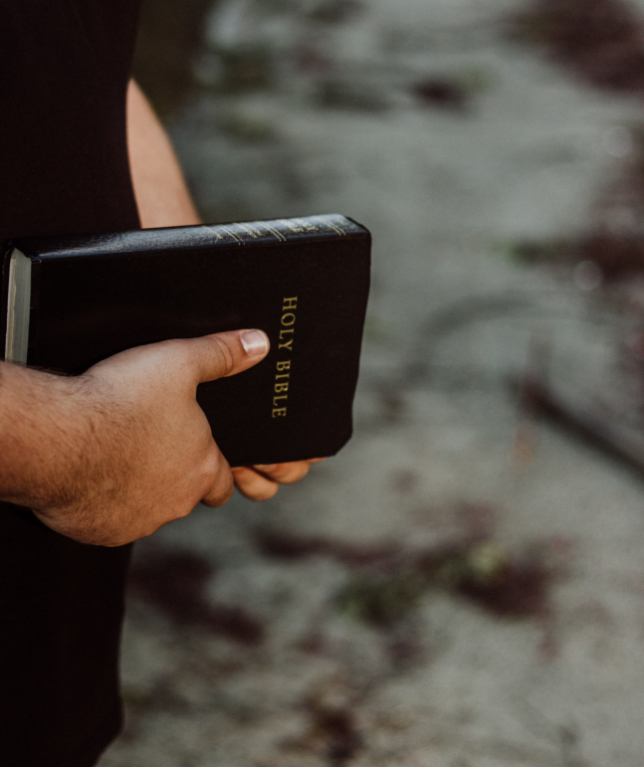 Man holding the holy bible